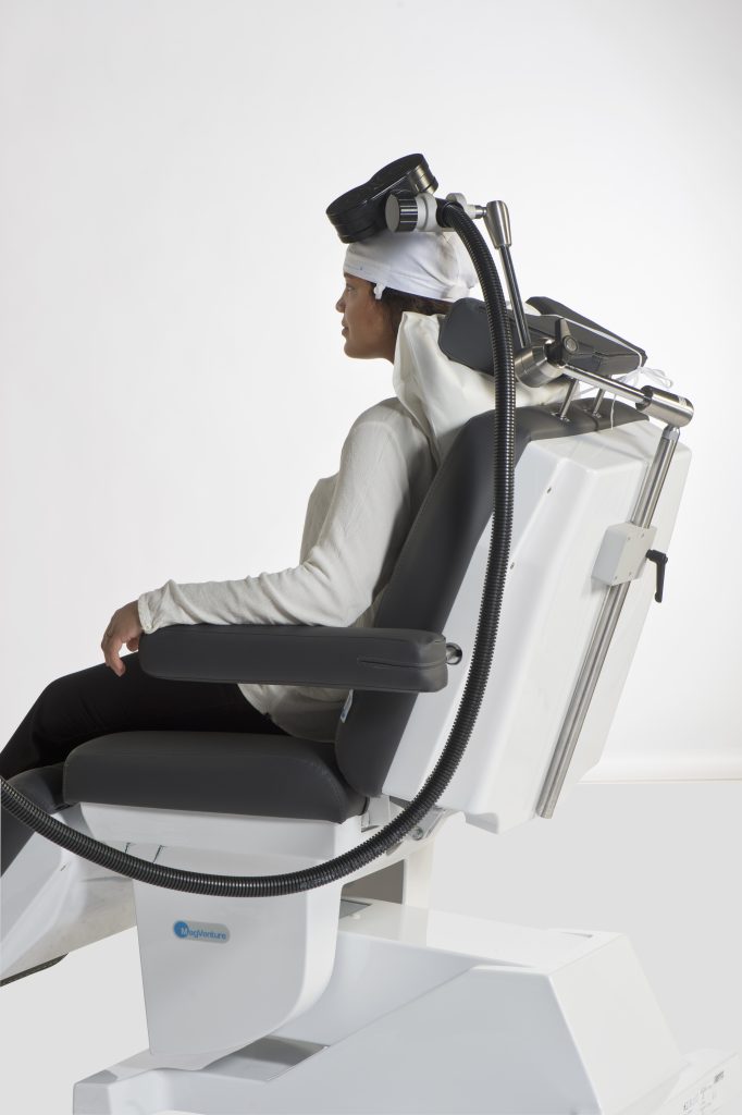 The patient gets transcranial magnetic stimulation for depression.